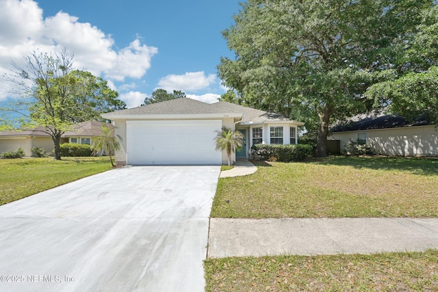 2734 Indigo Hills Ct, Jacksonville, FL 32221 - single story home featuring an attached garage, stucco siding, a front yard, and concrete driveway