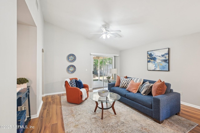 2734 Indigo Hills Ct, Jacksonville, FL 32221 - living room with lofted ceiling, wood finished floors, a ceiling fan, and baseboards