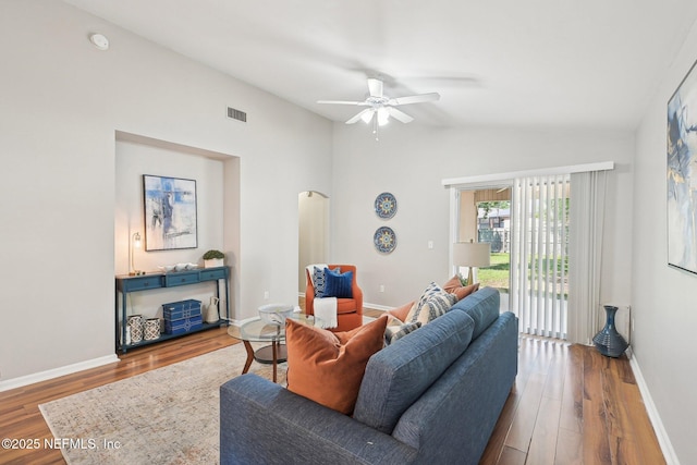 2734 Indigo Hills Ct, Jacksonville, FL 32221 - living area featuring visible vents, vaulted ceiling, wood finished floors, and ceiling fan