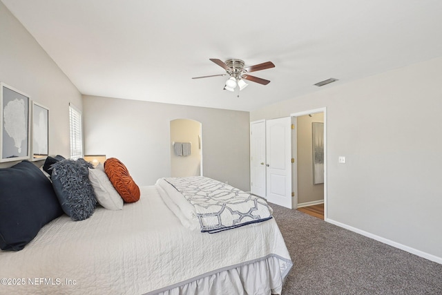 2734 Indigo Hills Ct, Jacksonville, FL 32221 - carpeted bedroom featuring ceiling fan, arched walkways, visible vents, and baseboards