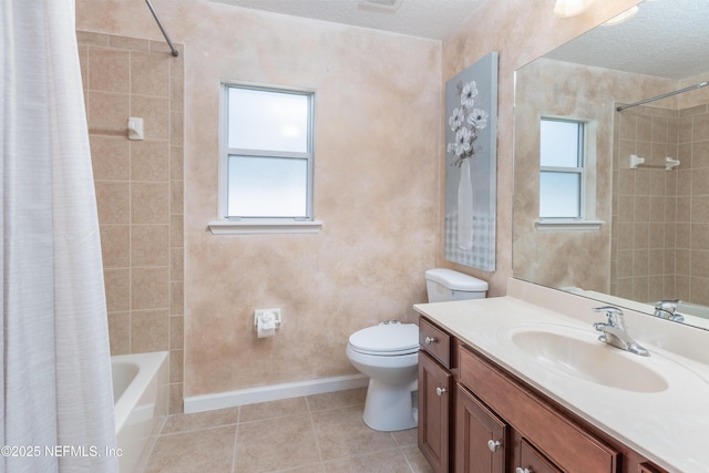 120 Oakwood Plantation Dr, Fleming Island, FL 32003 - bathroom featuring a wealth of natural light, tile patterned flooring, baseboards, and toilet