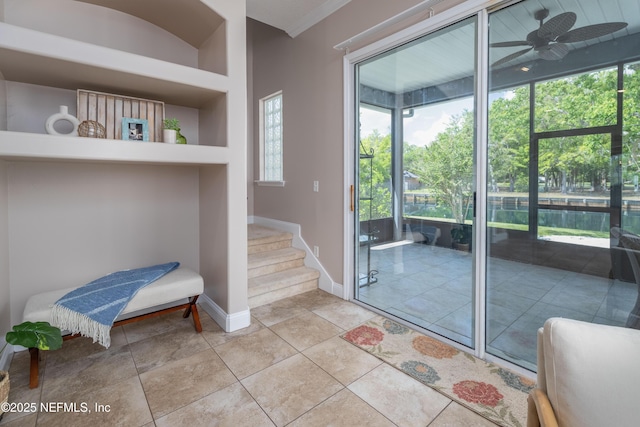 120 Oakwood Plantation Dr, Fleming Island, FL 32003 - doorway to outside featuring ceiling fan, baseboards, and a wealth of natural light