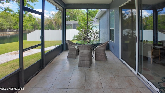 120 Oakwood Plantation Dr, Fleming Island, FL 32003 - unfurnished sunroom with a water view, outdoor dining area, and a healthy amount of sunlight