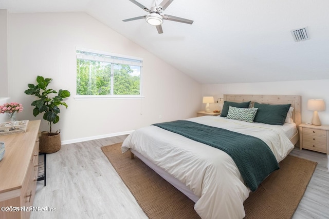 120 Oakwood Plantation Dr, Fleming Island, FL 32003 - bedroom with visible vents, light wood finished floors, baseboards, and lofted ceiling