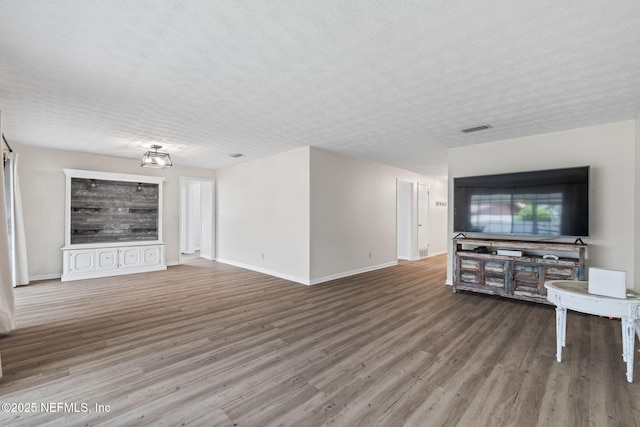 7876 Spanish Oaks Dr, Jacksonville, FL 32221 - unfurnished living room with wood finished floors and baseboards