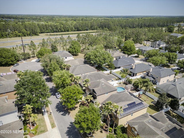 bird's eye view with a residential view and a forest view