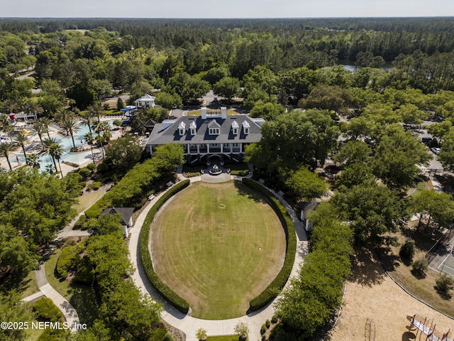aerial view featuring a view of trees