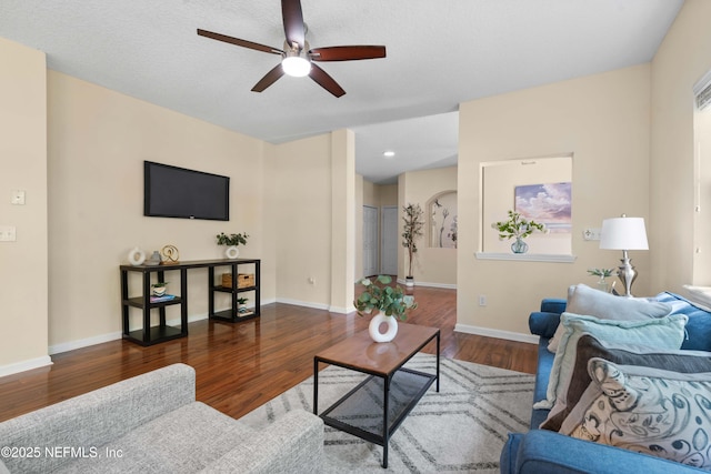 7250 Deerfoot Point Cir Unit 1, Jacksonville, FL 32256 - living area with ceiling fan, wood finished floors, and baseboards