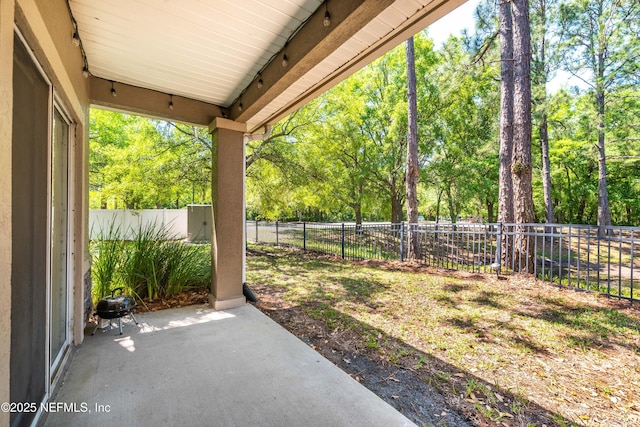 7250 Deerfoot Point Cir Unit 1, Jacksonville, FL 32256 - view of yard featuring a patio and fence