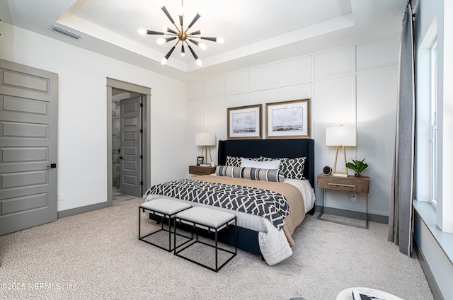 367 Maralinda Dr, Saint Augustine, FL 32095 - carpeted bedroom featuring visible vents, baseboards, an inviting chandelier, and a raised ceiling