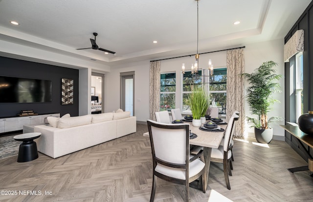 367 Maralinda Dr, Saint Augustine, FL 32095 - dining area with a wealth of natural light, recessed lighting, a tray ceiling, and ceiling fan with notable chandelier