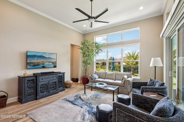 95566 Amelia National Pkwy, Fernandina Beach, FL 32034 - living area with a ceiling fan, ornamental molding, wood finished floors, recessed lighting, and a high ceiling