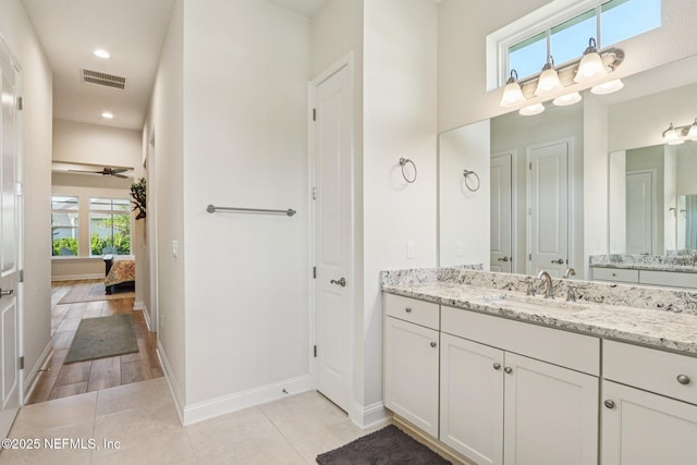 95566 Amelia National Pkwy, Fernandina Beach, FL 32034 - ensuite bathroom with vanity, recessed lighting, and tile patterned floors
