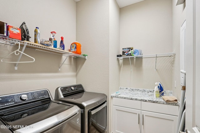 95566 Amelia National Pkwy, Fernandina Beach, FL 32034 - washroom featuring washer and clothes dryer and cabinet space