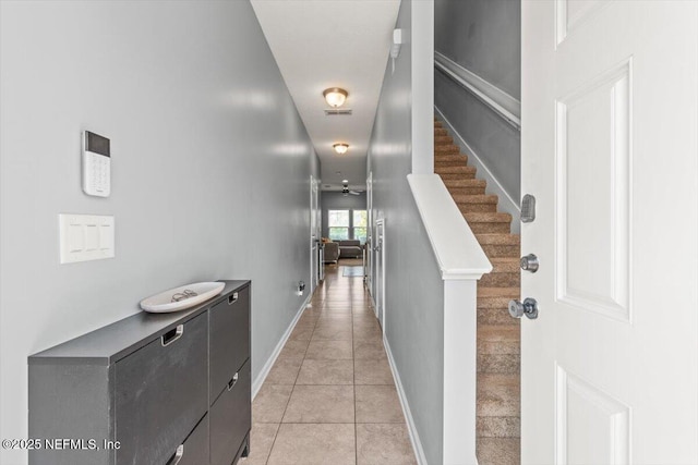 1580 Landau Rd, Jacksonville, FL 32225 - hallway with light tile patterned floors and baseboards