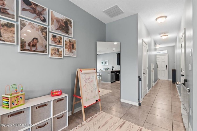 1580 Landau Rd, Jacksonville, FL 32225 - corridor featuring tile patterned floors and baseboards
