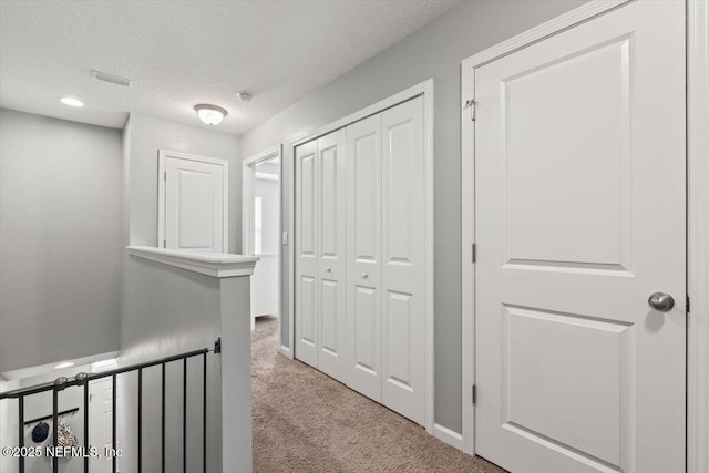 1580 Landau Rd, Jacksonville, FL 32225 - corridor featuring carpet and a textured ceiling