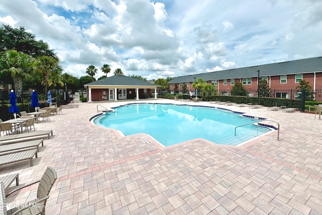 1580 Landau Rd, Jacksonville, FL 32225 - community pool featuring fence and a patio area