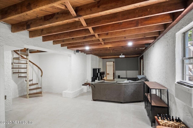 living room featuring stairs, a textured wall, and light tile patterned floors