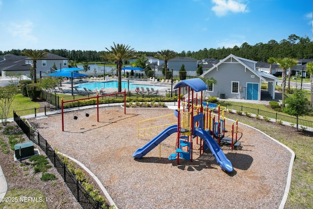597 Meadow Ridge Dr, Saint Augustine, FL 32092 - community play area featuring a community pool and fence