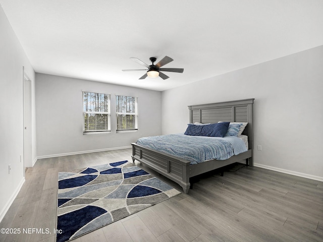 597 Meadow Ridge Dr, Saint Augustine, FL 32092 - bedroom with baseboards, a ceiling fan, and wood finished floors