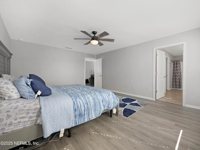 597 Meadow Ridge Dr, Saint Augustine, FL 32092 - bedroom featuring baseboards, ceiling fan, wood finished floors, and visible vents