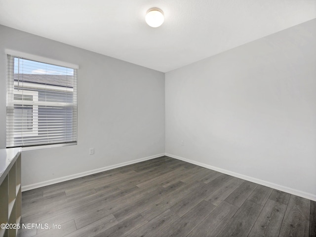 597 Meadow Ridge Dr, Saint Augustine, FL 32092 - spare room with baseboards and wood finished floors