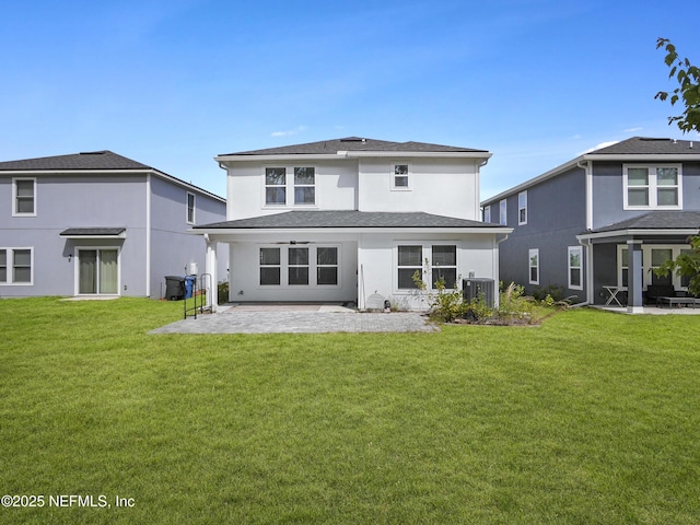 597 Meadow Ridge Dr, Saint Augustine, FL 32092 - rear view of property with a lawn, a patio area, and stucco siding