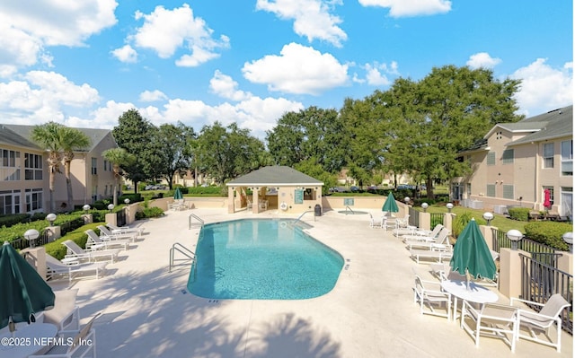 200 Augusta Cir, Saint Augustine, FL 32086 - community pool with a patio and a residential view