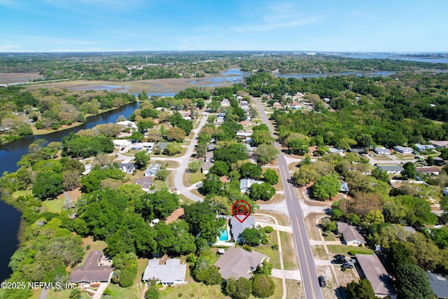 bird's eye view featuring a residential view and a water view