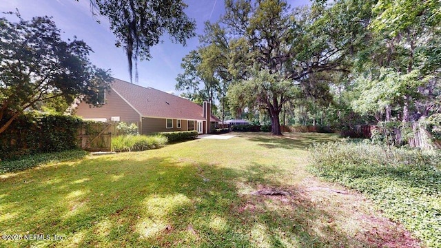 view of yard featuring fence