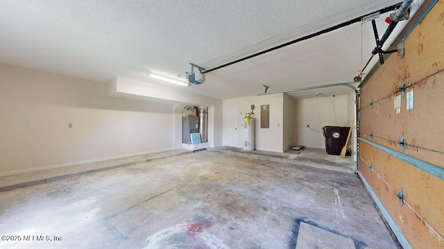 garage featuring water heater, electric panel, and a garage door opener