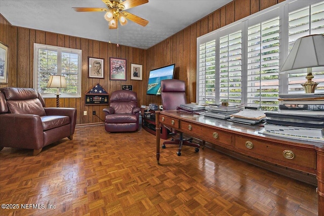 7812 Hunters Grove Rd, Jacksonville, FL 32256 - office area with wooden walls and a ceiling fan