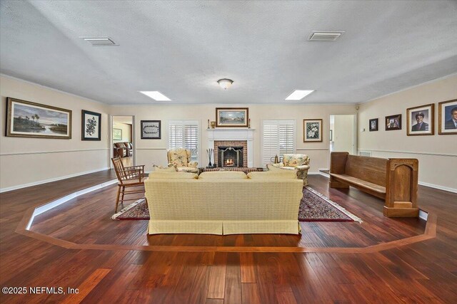 7812 Hunters Grove Rd, Jacksonville, FL 32256 - living room with visible vents, a textured ceiling, and a fireplace