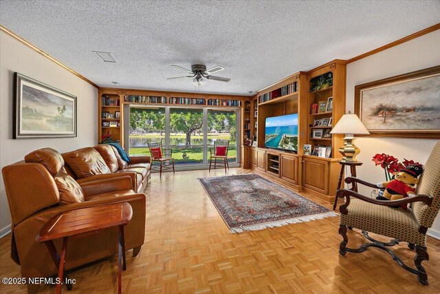 7812 Hunters Grove Rd, Jacksonville, FL 32256 - living room with a textured ceiling, built in features, ornamental molding, and a ceiling fan