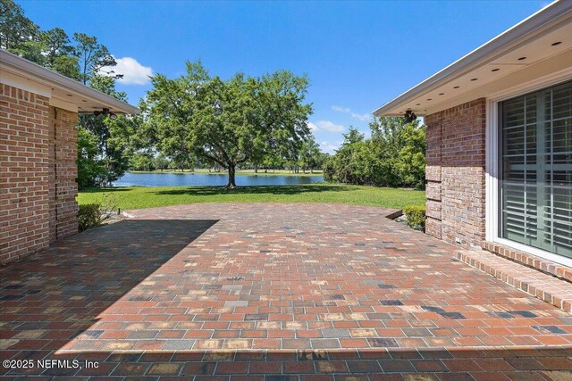 7812 Hunters Grove Rd, Jacksonville, FL 32256 - view of patio / terrace with a water view