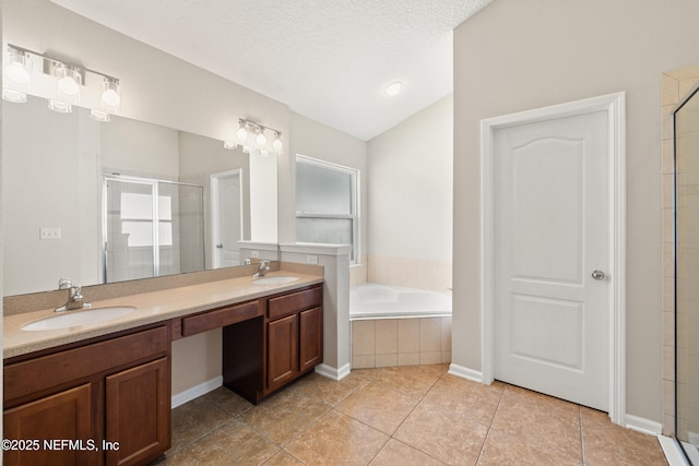 80 St Croix Island Dr, Saint Augustine, FL 32092 - full bathroom with lofted ceiling, a stall shower, double vanity, tile patterned flooring, and a bath