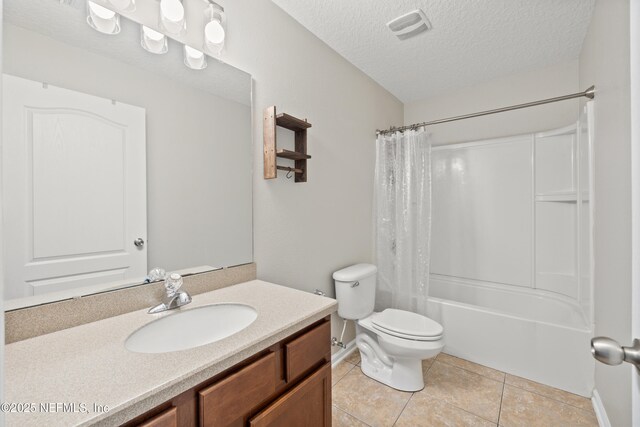 80 St Croix Island Dr, Saint Augustine, FL 32092 - bathroom with vanity, a textured ceiling, tile patterned floors, and shower / bath combination with curtain