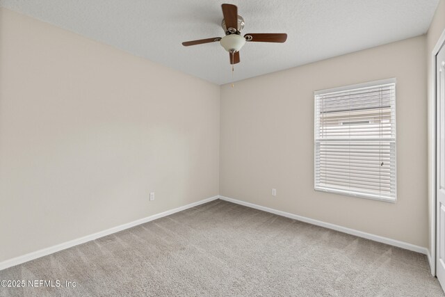 80 St Croix Island Dr, Saint Augustine, FL 32092 - carpeted spare room featuring a ceiling fan and baseboards