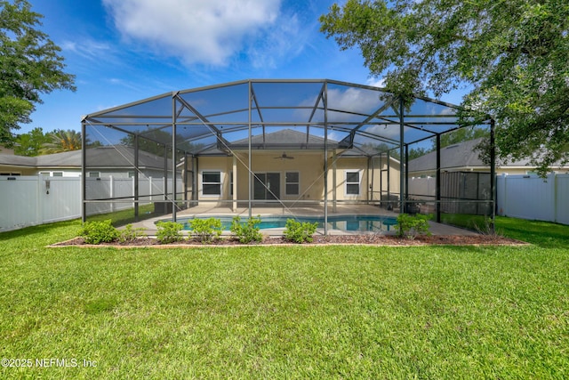 80 St Croix Island Dr, Saint Augustine, FL 32092 - rear view of property with a ceiling fan, a fenced backyard, a patio area, and a lanai