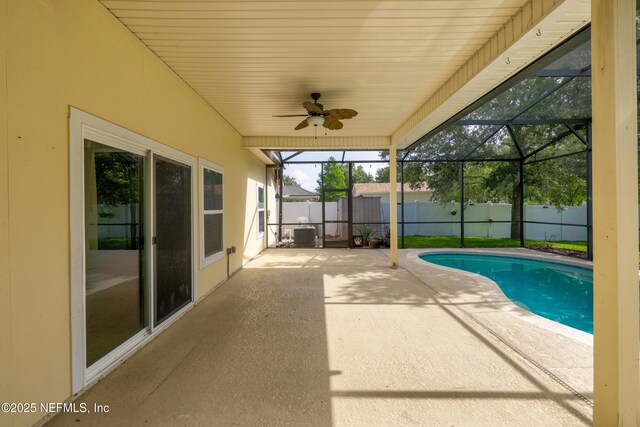 80 St Croix Island Dr, Saint Augustine, FL 32092 - view of pool featuring a patio, a fenced backyard, ceiling fan, and glass enclosure