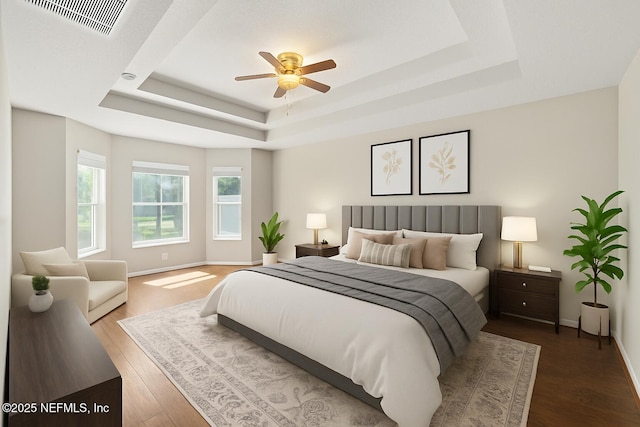 80 St Croix Island Dr, Saint Augustine, FL 32092 - bedroom with a tray ceiling, wood finished floors, and ceiling fan