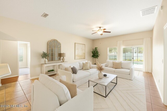 80 St Croix Island Dr, Saint Augustine, FL 32092 - living room with tile patterned flooring and a ceiling fan