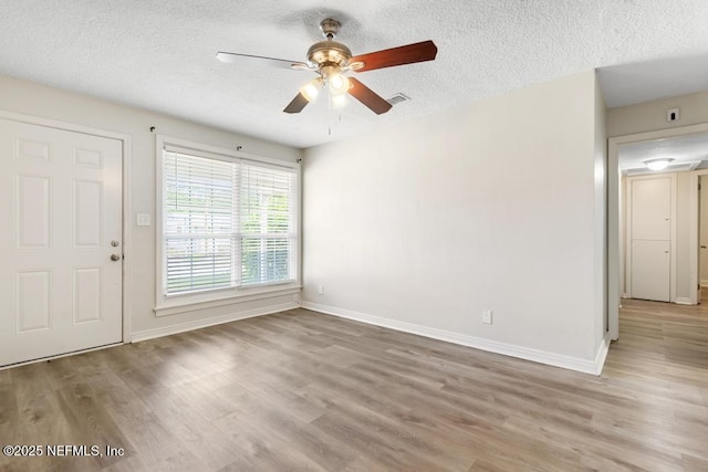 6504 Brandemere Rd S, Jacksonville, FL 32211 - interior space with baseboards, a textured ceiling, wood finished floors, and ceiling fan