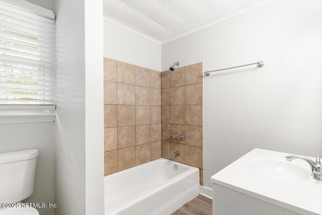 6504 Brandemere Rd S, Jacksonville, FL 32211 - bathroom with toilet, crown molding, bathtub / shower combination, vanity, and wood finished floors