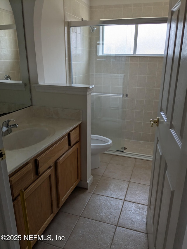 124 Hondo Dr, Saint Augustine, FL 32086 - bathroom with toilet, vanity, a shower stall, and tile patterned flooring