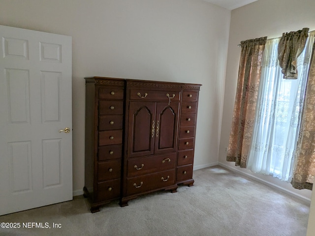 124 Hondo Dr, Saint Augustine, FL 32086 - bedroom with light carpet and baseboards