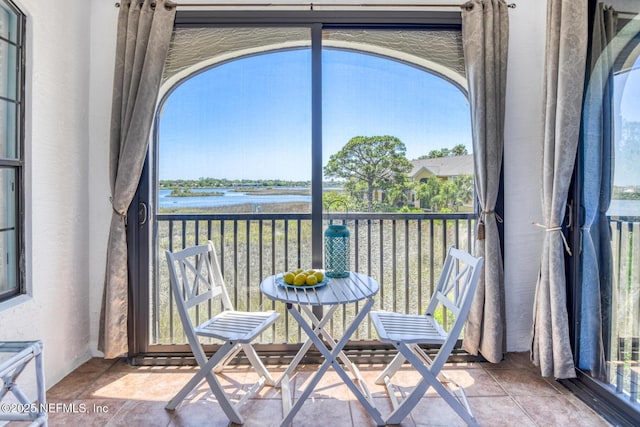 2229 Vista Cove Rd, Saint Augustine, FL 32084 - sunroom / solarium featuring a water view