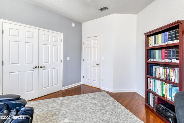 2229 Vista Cove Rd, Saint Augustine, FL 32084 - sitting room with wood finished floors and baseboards