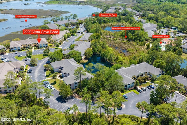 2229 Vista Cove Rd, Saint Augustine, FL 32084 - aerial view of property and surrounding area featuring a large body of water and nearby suburban area